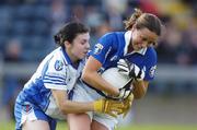 26 August 2006; Linda Brennan, Laois, is tackled by Joanne Courtney, Monaghan. TG4 Ladies Senior Football Championship Quarter-Final, Laois v Monaghan, Kingspan Breffni Park, Cavan. Picture credit: Damien Eagers / SPORTSFILE