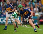 12 July 2014; James Barry, Tipperary, in action against Kevin Connolly, Offaly. GAA Hurling All-Ireland Senior Championship Round 2, Tipperary v Offaly, O'Moore Park, Portlaoise, Co. Laois. Picture credit: Piaras Ó Mídheach / SPORTSFILE