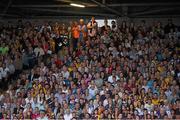19 July 2014; Supporters amongst the 18,964 who attended watch from the main stand in fading light. GAA Hurling All Ireland Senior Championship, Round 2, Waterford v Wexford, Nowlan Park, Kilkenny. Picture credit: Ray McManus / SPORTSFILE