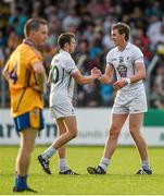 19 July 2014; Cathal McNally, left, and Sean Hurley, Kildare, celebrate after victory over Clare. GAA Football All Ireland Senior Championship, Round 3B, Clare v Kildare, Cusack Park, Ennis, Co. Clare. Picture credit: Diarmuid Greene / SPORTSFILE
