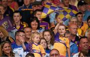 19 July 2014; Cousins Sarah Doyle, left, aged 4, and Isobelle Hayes, aged 5, from Oulart, cheer on Wexford before the game. GAA Hurling All Ireland Senior Championship, Round 2, Waterford v Wexford, Nowlan Park, Kilkenny. Picture credit: Ray McManus / SPORTSFILE