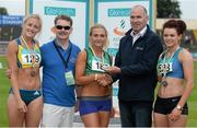 19 July 2014; Jim Dowdall, CEO, GloHealth, right, presents the gold medal for the Women's 200m to Kelly Proper, Ferrybank AC, Waterford, in the company of silver medallist Sarah Lavin, left, UCD AC, Dublin, Steffi Creaner, Dublin City Harriers AC, Dublin and Ciarán Ó Catháin, President, AAI. GloHealth Senior Track and Field Championships, Morton Stadium, Santry, Co. Dublin. Picture credit: Brendan Moran / SPORTSFILE