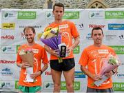 20 July 2014; Paddy Hamilton, centre, winner of the Men's Fingal 10K - SSE Airtricity Dublin Race Series 2014, with Mark Hoey, right, second place and Simon Ryan, third place. Fingal 10K - SSE Airtricity Dublin Race Series 2014. Swords, Co. Dublin. Picture credit: David Maher / SPORTSFILE