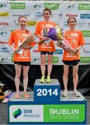 20 July 2014; Michelle McGee, centre, winner of the Women's Fingal 10K - SSE Airtricity Dublin Race Series 2014, with Ailish Malone, right, second place and Fiona Stack, third place. Fingal 10K - SSE Airtricity Dublin Race Series 2014. Swords, Co. Dublin. Picture credit: David Maher / SPORTSFILE