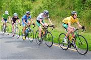 20 July 2014; Race leader Eddie Dunbar, Team Ireland, leads the breakaway during Stage 6 of the 2014 International Junior Tour of Ireland, Ennis - Ennis, Co. Clare. Picture credit: Stephen McMahon / SPORTSFILE