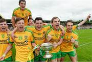 20 July 2014; The Donegal players celebrate with the cup after the game. Electric Ireland Ulster GAA Football Minor Championship Final, Armagh v Donegal, St Tiernach's Park, Clones, Co. Monaghan. Photo by Sportsfile