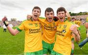 20 July 2014; Donegal players, from left, Jamie Brennan, John McDyre, and Colm Kelly, celebrate at the end of the game. Electric Ireland Ulster GAA Football Minor Championship Final, Armagh v Donegal, St Tiernach's Park, Clones, Co. Monaghan. Photo by Sportsfile