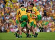 20 July 2014; Donegal players celebrate at the final whistle. Electric Ireland Ulster GAA Football Minor Championship Final, Armagh v Donegal, St Tiernach's Park, Clones, Co. Monaghan. Photo by Sportsfile