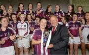 20 July 2014; Pat Quill, President of the LGFA, presents the cup to Galway captain Marie Mitchell. All-Ireland U14 'B' Ladies Football Championship Final, Galway v Waterford, MacDonagh Park, Nenagh, Co. Tipperary. Picture credit: Matt Browne / SPORTSFILE