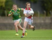 20 July 2014; Roisin Kelly, Mayo, in action against Labhaoise Walmsley, Kerry. All-Ireland U14 'A' Ladies Football Championship Final, Kerry v Mayo, MacDonagh Park, Nenagh, Co. Tipperary. Picture credit: Matt Browne / SPORTSFILE