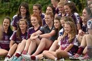 20 July 2014; Kerry footballer Colm Cooper has his picture taken with members from the winning Galway team. All-Ireland U14 'B' Ladies Football Championship Final, Galway v Waterford, MacDonagh Park, Nenagh, Co. Tipperary. Picture credit: Matt Browne / SPORTSFILE