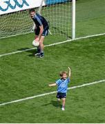 20 July 2014; Jamie Brogan, aged 5, son of Alan, celebrates after scoring a goal past Stephen Cluxton after the game. Leinster GAA Football Senior Championship Final, Dublin v Meath, Croke Park, Dublin. Picture credit: Dáire Brennan / SPORTSFILE