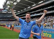 20 July 2014; Donal McIlgorm, Dublin, celebrates with the Fr. Larry Murray cup after the game. Electric Ireland Leinster GAA Football Minor Championship Final, Kildare v Dublin, Croke Park, Dublin. Picture credit: Dáire Brennan / SPORTSFILE