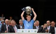 20 July 2014; Dublin captain Con O'Callaghan lifts the cup after the game. Electric Ireland Leinster GAA Football Minor Championship Final, Kildare v Dublin, Croke Park, Dublin. Picture credit: Barry Cregg / SPORTSFILE