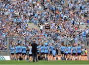 20 July 2014; A general view of the Dublin team celebrateing victory at Hill 16 as team doctor Dr. David Hickey takes his own photograph. Leinster GAA Football Senior Championship Final, Dublin v Meath, Croke Park, Dublin. Picture credit: Ashleigh Fox / SPORTSFILE