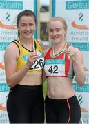 20 July 2014; Joint winners Phil Healy, left, Bandon AC, Cork and Amy Foster, City of Lisburn AC, Antrim, with their medals after finishing in a dead heat in the Women's 100m Final. GloHealth Senior Track and Field Championships, Morton Stadium, Santry, Co. Dublin. Picture credit: Brendan Moran / SPORTSFILE