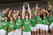 20 July 2014; Kerry captain Erica McGlynn lifts the cup as her team-mates celebrate. All-Ireland U14 'A' Ladies Football Championship Final, Kerry v Mayo, MacDonagh Park, Nenagh, Co. Tipperary. Picture credit: Matt Browne / SPORTSFILE
