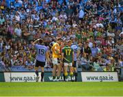 20 July 2014; Referee Padraig Hughes issues a Yellow Card to Meath goalkeeper Patrick O'Rourke, left, Michael Burke, and Dublin's Eoghan O'Gara late in the game. Leinster GAA Football Senior Championship Final, Dublin v Meath, Croke Park, Dublin. Picture credit: Ray McManus / SPORTSFILE
