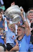 20 July 2014; Dublin's Eoghan O'Gara lifts the Delaney Cup with his daughter Ella. Leinster GAA Football Senior Championship Final, Dublin v Meath, Croke Park, Dublin. Picture credit: Ashleigh Fox / SPORTSFILE