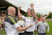 20 July 2014; Donegal manager Jim McGuinness, right,  celebrates with assistant manager Paul McGonigle at the final whistle. Ulster GAA Football Senior Championship Final, Donegal v Monaghan, St Tiernach's Park, Clones, Co. Monaghan. Picture credit: Oliver McVeigh / SPORTSFILE