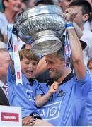 20 July 2014; Dublin's Alan Brogan lifts the Delaney cup with his five year old son Jamie. Leinster GAA Football Senior Championship Final, Dublin v Meath, Croke Park, Dublin. Picture credit: Ashleigh Fox / SPORTSFILE