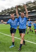 20 July 2014; Dublin players Cian Murphy, left, and Warren Egan celebrate victory with the cup after the game. Electric Ireland Leinster GAA Football Minor Championship Final, Kildare v Dublin, Croke Park, Dublin. Picture credit: Barry Cregg / SPORTSFILE
