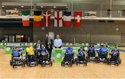 20 July 2014; France captain Erwan Conq and team-mates celebrate with the trophy in the company of European Powerchair Football Association president Nicholas Dubes, left, FAI president Paddy McCaul, centre, and Neil Harvey, country manager of title sponsor Invacare, right. European Powerchair Football Nations Cup Final, England v France, University of Limerick, Limerick. Picture credit: Diarmuid Greene / SPORTSFILE