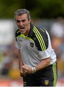 20 July 2014; Donegal manager Jim McGuinness celebrates his side's last score. Ulster GAA Football Senior Championship Final, Donegal v Monaghan, St Tiernach's Park, Clones, Co. Monaghan. Picture credit: Oliver McVeigh / SPORTSFILE