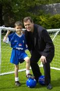 23 August 2006; Technical Director of the FAI and Irish goalkeeping legend Packie Bonner with Dylan Murray, age 8, from Lucan, Dublin, one of two winners of the 'Pepsi Dream Prize' - the chance to meet international footballing hero theirry Henry, a competition run in conjunction with the Pepsi FAI Summer Soccer Schools. The other winner was Josh Lydon, age 8, from Galway, who was unable to make the photocall. St. Stephens Green, Dublin. Picture credit: Brendan Moran / SPORTSFILE