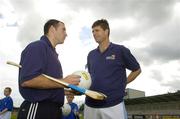 23 August 2006; Tipperary hurler Eoin Kelly, left, in conversation with former Republic of Ireland international Niall Quinn during the Dublin Docklands Festival of Hurling and Gaelic Football. Parnell Park, Dublin. Picture credit: Pat Murphy / SPORTSFILE