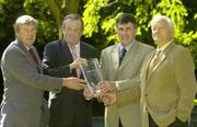 24 August 2006; Former Dublin Gaelic football great Jimmy Keaveney, second from left, was today inducted into the prestigious MBNA Kick Fada Hall of Fame. He is presented with an award by his fellow members of the MBNA Kick Fada Hall of Fame, from left, Donnie O'Sullivan, former Kerry footballer, Dermot Earley, former Roscommon footballer, and Peter Nolan, former Offaly footballer.The MBNA Kick Fada Hall of Fame, honours the greatest distance and most accurate kickers in Gaelic Football past and present. MBNA Headquarters, St. Stephens Green, Dublin. Picture credit: Pat Murphy / SPORTSFILE