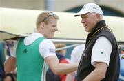 26 August 2006; Ireland rowing head coach Harald Jahrling, right, congratulates Alan Martin, stroke, a member of the Heavyweight four's team of, Sean Casey, 3rd seat, Sean O'Neill, 2nd seat, and Cormac Folan, bow, after crossing the finish line first, to win the Men's four, B final, at the 2006 World Rowing Championships. Dorney Lake, Eton, England. Picture credit; David Maher / SPORTSFILE