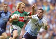 27 August 2006; Mayo's Conor Mortimer goes past the challenge of Dublin goalkeeper Stephen Cluxton before kicking the ball over the bar for a point. Bank of Ireland All-Ireland Senior Football Championship Semi-Final, Dublin v Mayo, Croke Park, Dublin. Picture credit; Damien Eagers / SPORTSFILE