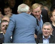 27 August 2006; Leader of the opposition Enda Kenny T.D., wishes An Taoiseach Bertie Ahern T.D. well before the start of the game watched by former President of the GAA Sean McCague. Tommy Murphy Cup Final, Louth v Leitrim, Croke Park, Dublin. Picture credit; Brian Lawless / SPORTSFILE