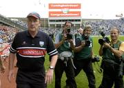 27 August 2006; Louth manager Eamon McEneaney is followed by photoraphers at the end of the match. Tommy Murphy Cup Final, Louth v Leitrim, Croke Park, Dublin. Picture credit; Damien Eagers / SPORTSFILE