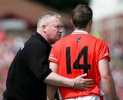 26 June 2005; Armagh assistant manager Paul Grimley speaks with Ronan Clarke during the game. Bank of Ireland Ulster Senior Football Championship Semi-Final, Armagh v Derry, Casement Park, Belfast. Picture Credit; Oliver McVeigh / SPORTSFILE
