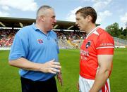 11 June 2006; Kieran McGeeney, Armagh, in conversation with assistant manager Paul Grimley before the game. Bank of Ireland Ulster Senior Football Championship, Semi-Final, Armagh v Fermanagh, St. Tighernach's Park, Clones, Co. Monaghan. Picture credit: Oliver McVeigh / SPORTSFILE