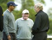 28 August 2006; Tiger Woods of the USA, in conversation with Dermot Desmond and Richard Hills, centre, European Director of the Ryder Cup, as Woods prepares to drive off at the 1st tee box during the USA Ryder Cup team's practice on the Palmer Course. K Club, Straffan, Co. Kildare. Picture credit: Brendan Moran / SPORTSFILE