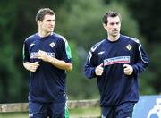 30 August 2006; Northern Ireland's Aaron Hughes and Keith Gillespie in action during squad training. Newforge Country Club, Belfast, Co. Antrim. Picture credit: Oliver McVeigh / SPORTSFILE
