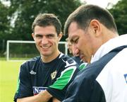 30 August 2006; Aaron Hughes, Northern Ireland, with manager Lawrie Sanchez, during squad training. Newforge Country Club, Belfast, Co. Antrim. Picture credit: Oliver McVeigh / SPORTSFILE
