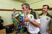 20 July 2014; Donegal manager Jim McGuinness celebrates with the Anglo Celt cup in the dressing room after the game. Ulster GAA Football Senior Championship Final, Donegal v Monaghan, St Tiernach's Park, Clones, Co. Monaghan. Photo by Sportsfile