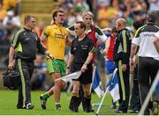 20 July 2014; Eamonn McGee, Donegal, is taken off the pitch with an injury. Ulster GAA Football Senior Championship Final, Donegal v Monaghan, St Tiernach's Park, Clones, Co. Monaghan. Photo by Sportsfile