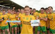 20 July 2014; Electric Ireland, proud sponsor of the GAA Minor Championships presented Donegal Minor footballer Cormac Callaghan with his #PoweringMinors Award. Electric Ireland are awarding iPads to current Minor players who have reached the provincial final stages of the 2014 campaign. Players on Minor football and hurling panels have nominated one player on their team who they feel has stood out in terms of performance and attitude throughout this year’s campaign. The #PoweringMinors award demonstrates Electric Irelands’ commitment to the futures of current minor players. Electric Ireland Ulster GAA Football Minor Championship Final, Armagh v Donegal, St Tiernach's Park, Clones, Co. Monaghan. Picture credit: Oliver McVeigh / SPORTSFILE