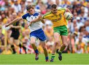 20 July 2014; Leo McLoone, Donegal, in action against Dessie Mone, Monaghan. Ulster GAA Football Senior Championship Final, Donegal v Monaghan, St Tiernach's Park, Clones, Co. Monaghan. Photo by Sportsfile