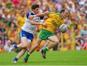 20 July 2014; Colm McFadden, Donegal, in action against Darren Hughes, Monaghan. Ulster GAA Football Senior Championship Final, Donegal v Monaghan, St Tiernach's Park, Clones, Co. Monaghan. Photo by Sportsfile