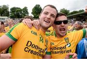 20 July 2014; Donegal captain Michael Murphy celebrates with a fan after the game. Ulster GAA Football Senior Championship Final, Donegal v Monaghan, St Tiernach's Park, Clones, Co. Monaghan. Photo by Sportsfile