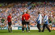 20 July 2014; Referee Padraig Hughes, second from left, consults his sidelines men and umpires before showing yellow cards to Dublin's Eoghan O'Gara and Meath's Michael Burke and Patrick O'Rourke during the second half. Leinster GAA Football Senior Championship Final, Dublin v Meath, Croke Park, Dublin. Picture credit: Piaras Ó Mídheach / SPORTSFILE