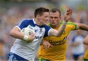 20 July 2014; Conor McManus, in action against Neil McGee, Monaghan. Ulster GAA Football Senior Championship Final, Donegal v Monaghan, St Tiernach's Park, Clones, Co. Monaghan. Picture credit: Oliver McVeigh / SPORTSFILE
