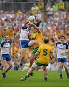 20 July 2014; Neil Gallagher, Donegal, in action against Darren Hughes, Monaghan. Ulster GAA Football Senior Championship Final, Donegal v Monaghan, St Tiernach's Park, Clones, Co. Monaghan. Picture credit: Oliver McVeigh / SPORTSFILE