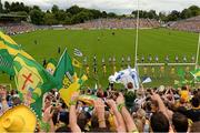 20 July 2014; The Donegal and Monaghan teams during the parade. Ulster GAA Football Senior Championship Final, Donegal v Monaghan, St Tiernach's Park, Clones, Co. Monaghan. Picture credit: Oliver McVeigh / SPORTSFILE
